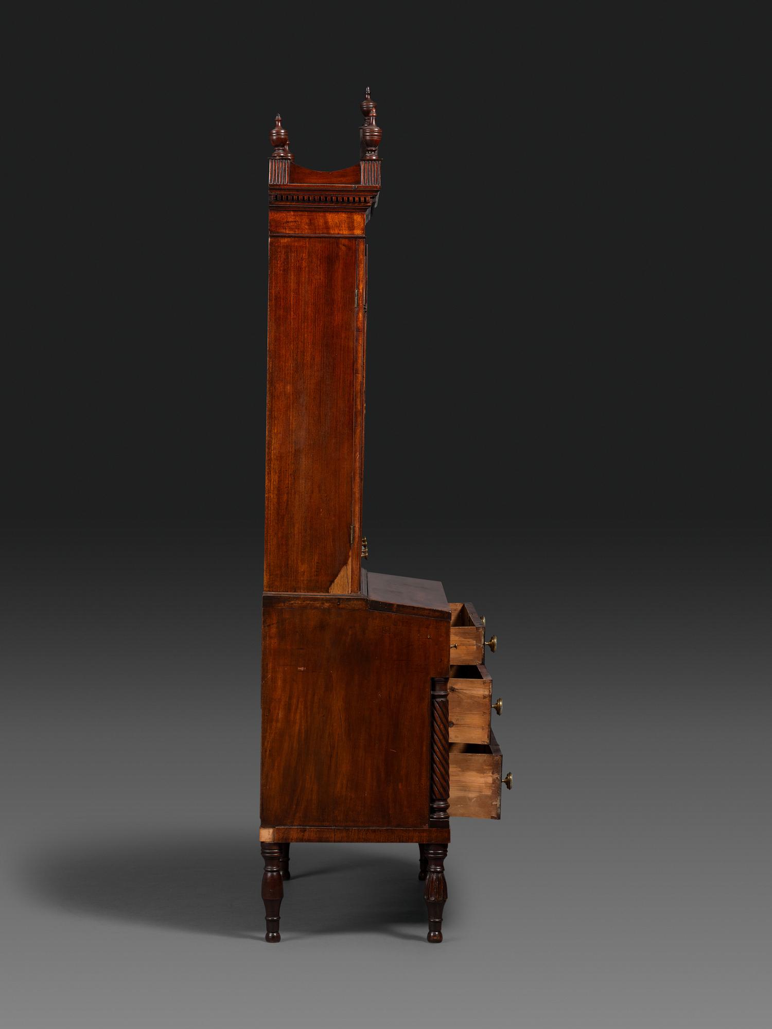 A Federal Carved and Figured Mahogany Lady's Writing Desk