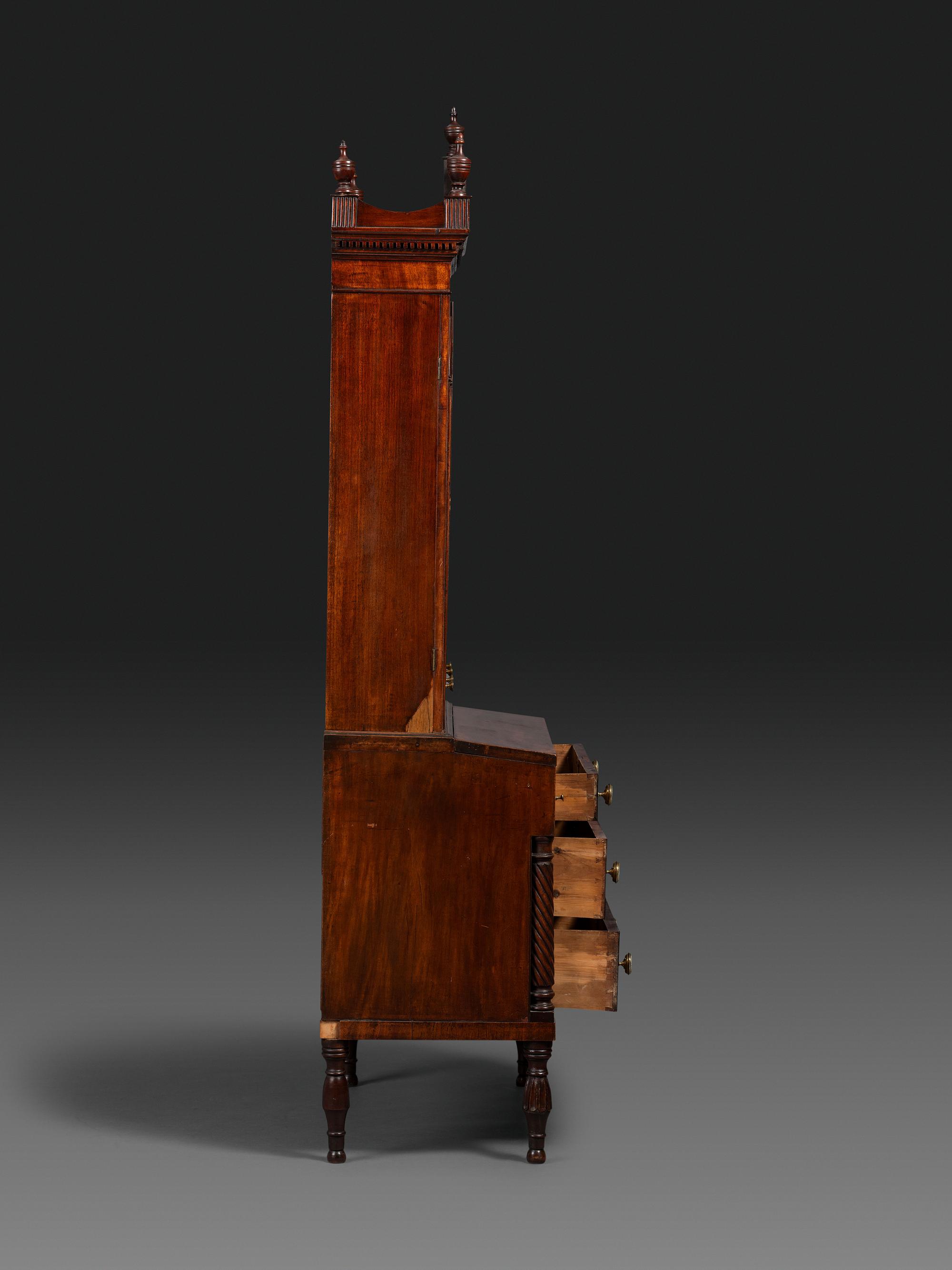 A Federal Carved and Figured Mahogany Lady's Writing Desk