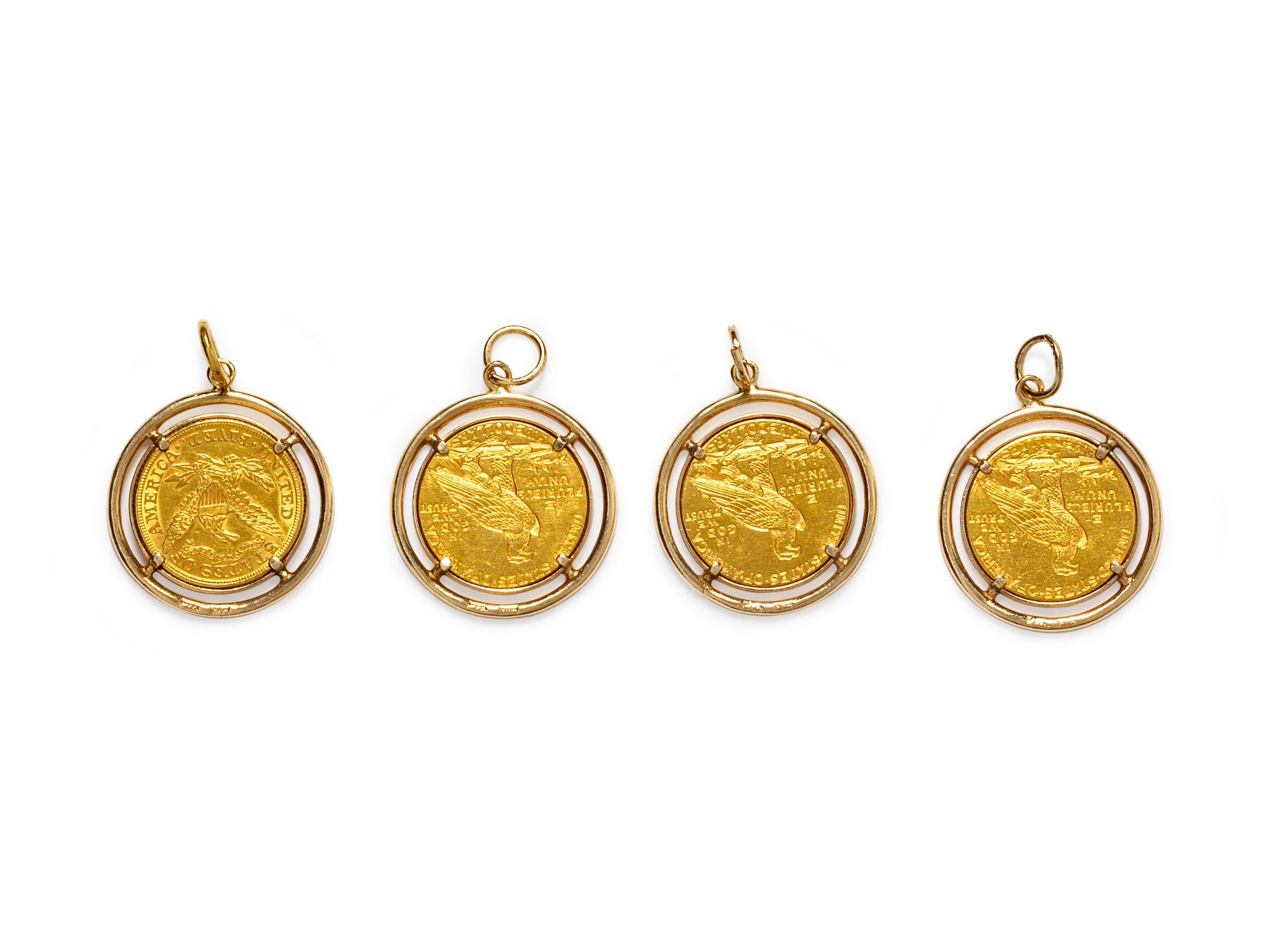 A Collection of 14 Karat Yellow Gold and Coin Pendants,
