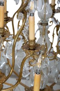 A French Gilt Bronze and Cut Glass Twenty-Light Chandelier