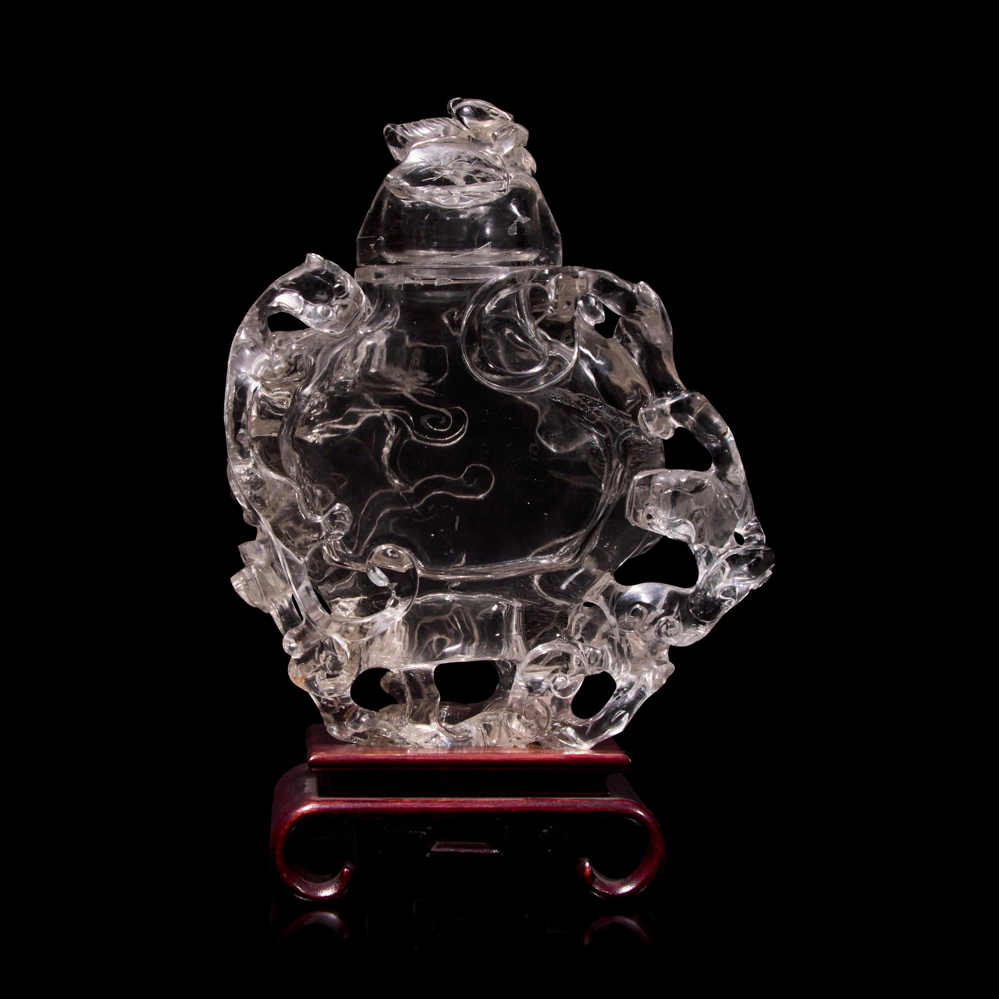 A Chinese Rock Crystal Vase and Cover Carved with Clouds, 20th Century 近代 高浮雕螭龍紋水晶扁壺