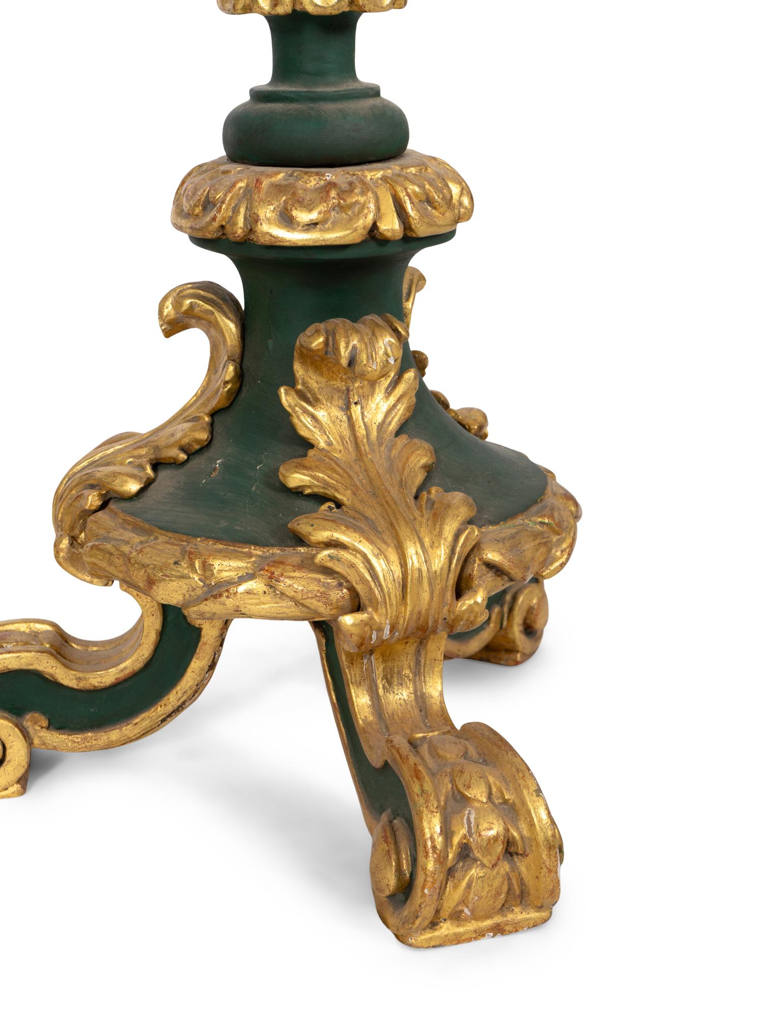 A Pair of Large Italian Painted and Parcel Gilt Prickets