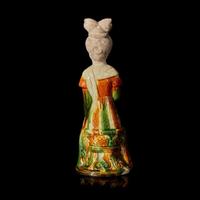 A Chinese sancai-glazed pottery figure of a seated woman 唐三彩仕女坐像 Tang dynasty ?