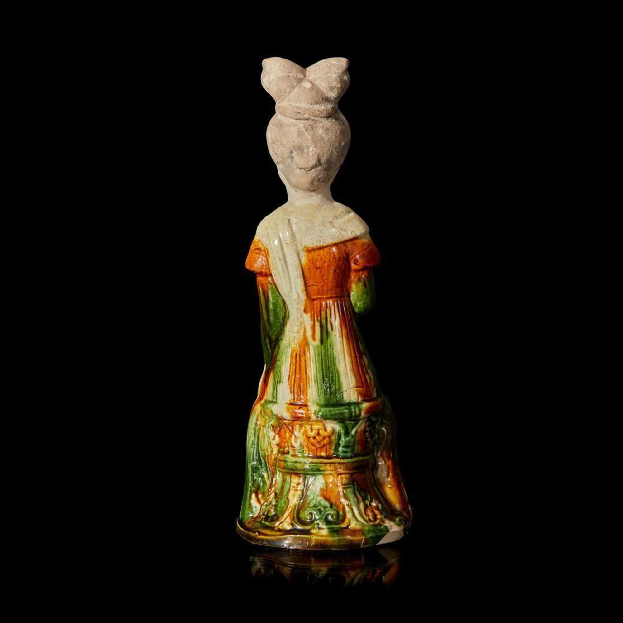 A Chinese sancai-glazed pottery figure of a seated woman 唐三彩仕女坐像 Tang dynasty ?