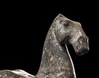 A Chinese Grey Pottery Figure of a Recumbent Horse