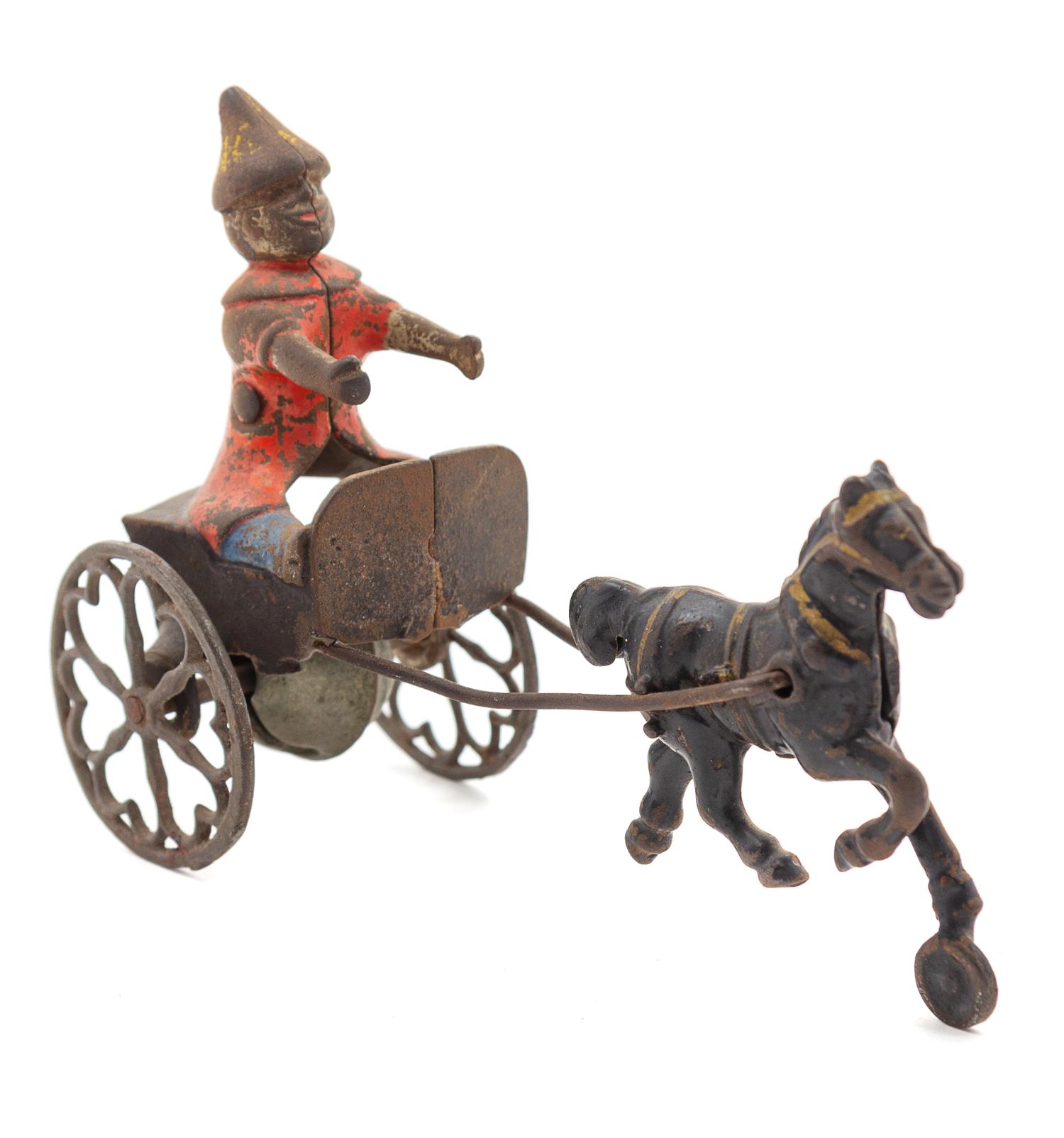 A Gong Bell Co. Horse-Drawn Clown Toy