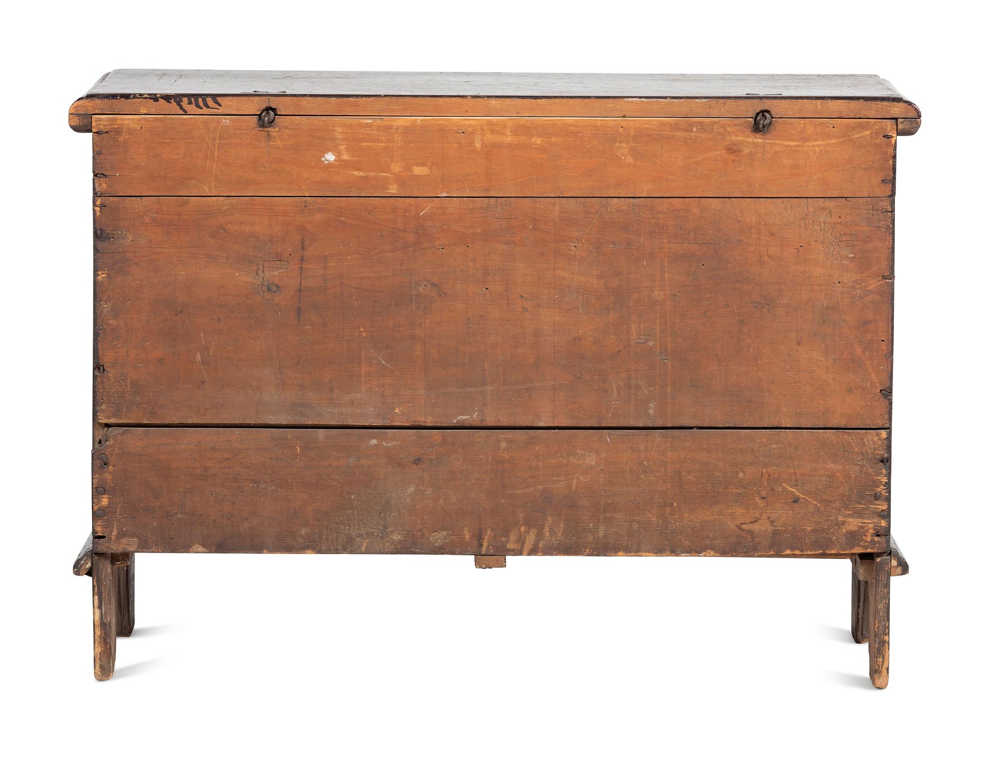 A Rare Pilgrim Century Black Painted Pine One-Drawer 'M' Chest
