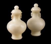 A Pair of Chinese Peking Style Glass Vases and Covers
