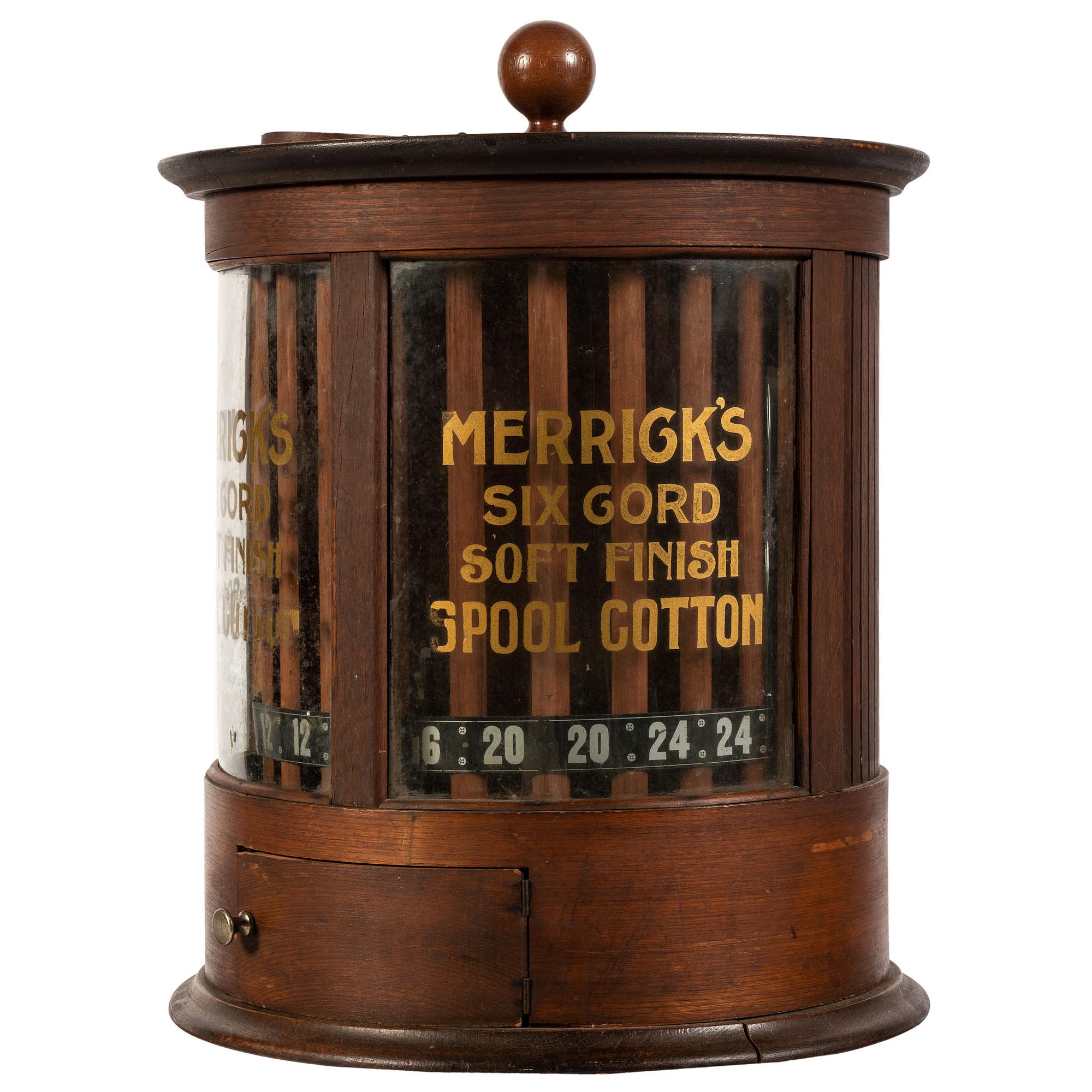 A Merrick's Six Cord Cylindrical Spool Cabinet