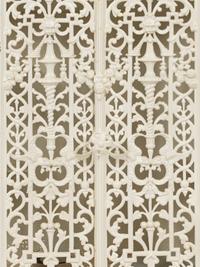 A White-Painted Cast Iron Cabinet