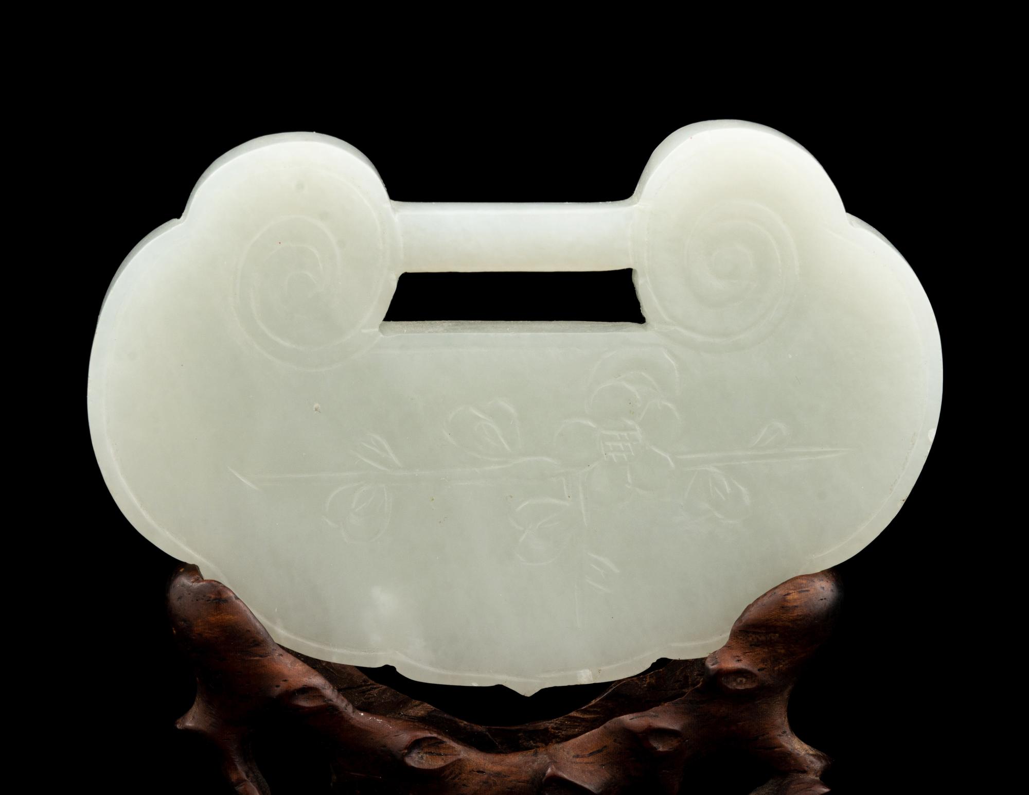 A White Jade Lock-Form Pendant with Stand