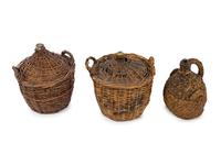 A Group of Seven Continental Rattan and Glass Wine Jugs