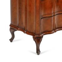 An Italian Walnut Serpentine-Front Chest of Drawers