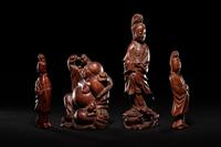 Four Chinese Carved Hardwood Figures