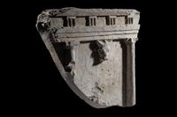 A Greco-Roman Limestone Fragment with Entablature and Bucranium
