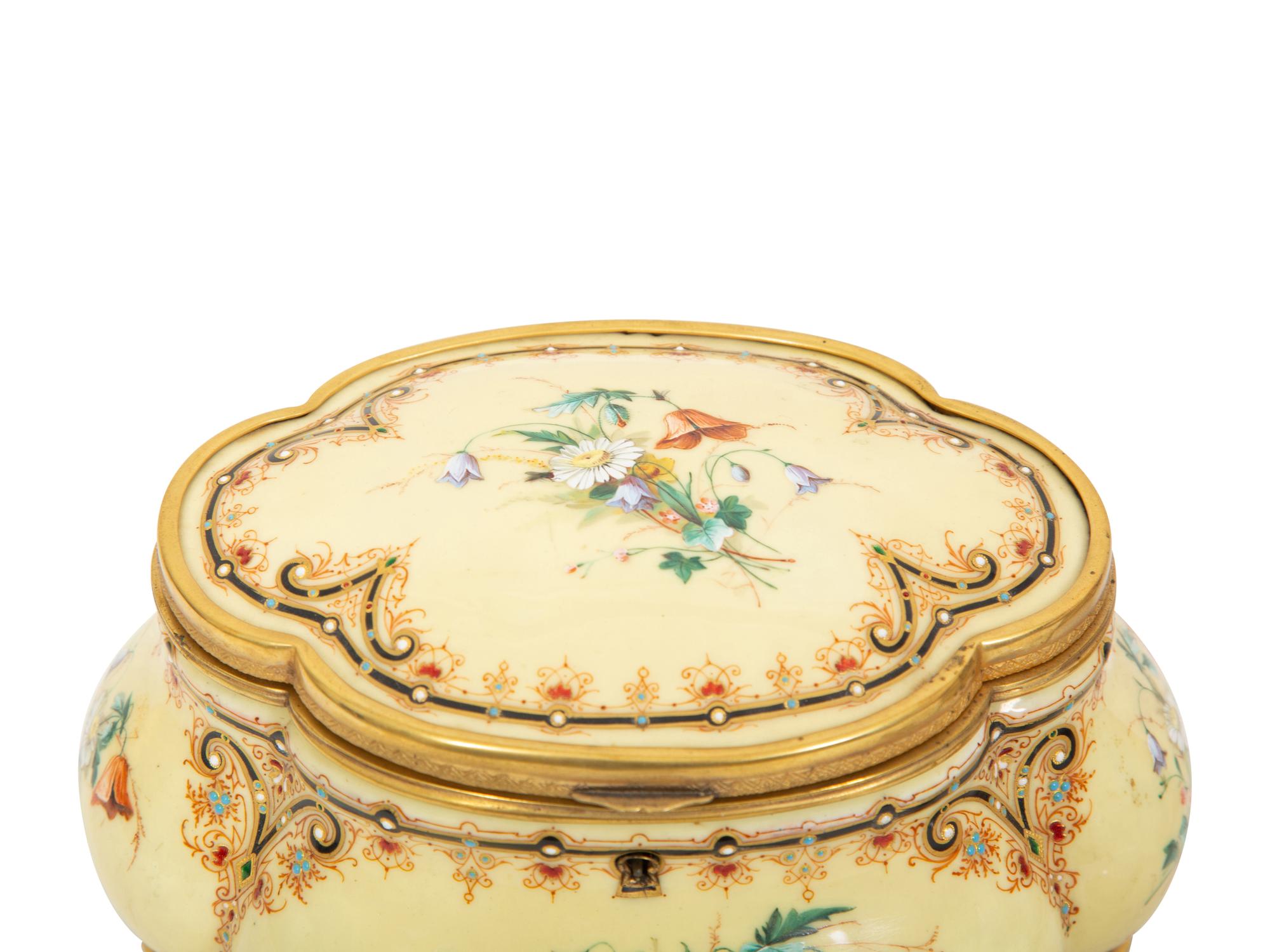 A Group of Three French Gilt Metal Mounted Porcelain Boxes