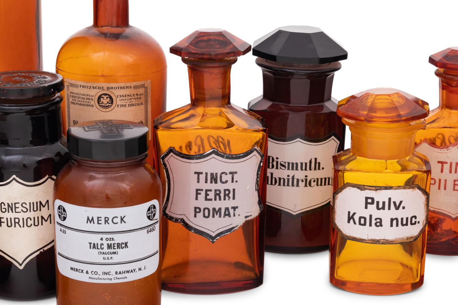 A Collection of Amber Glass Apothecary Jars