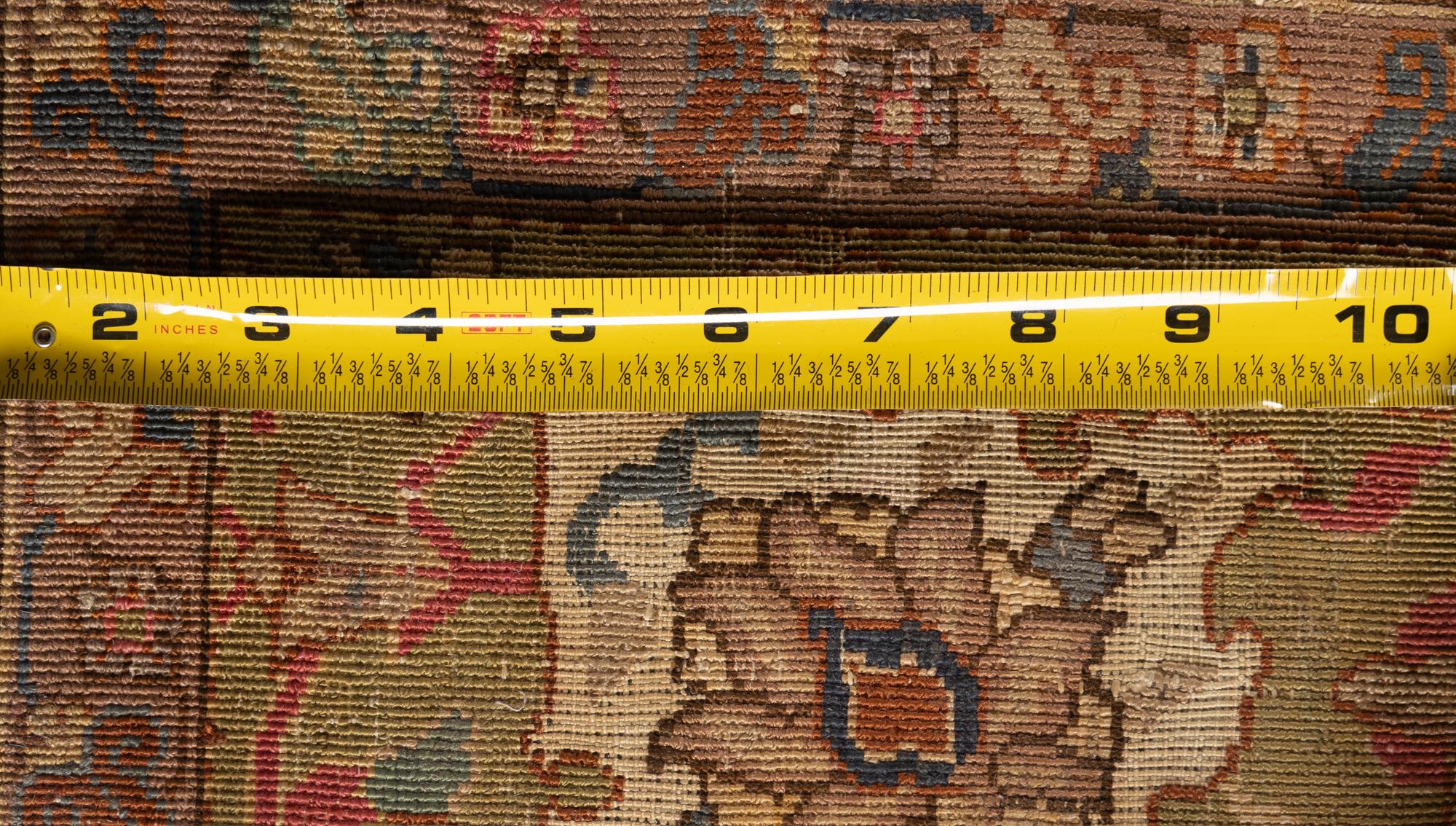 An Indian Silk and Metallic Thread Rug