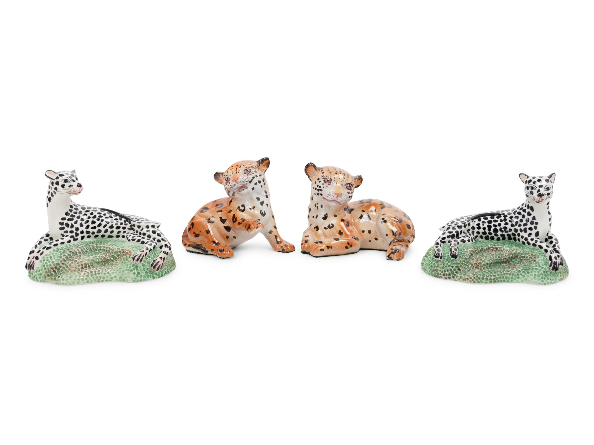 A Pair of Italian Faience Cheetah Cubs and a Pair of Mottahedeh Cats