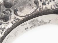 A German Silver Five-Piece "Putti" Table Garniture