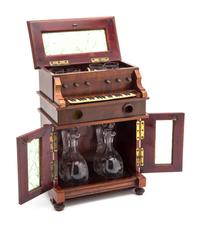 A Musical Cave a Liqueur Set, Height 12 inches.