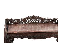 A Chinese Carved Hardwood Four-Piece Furniture Suite