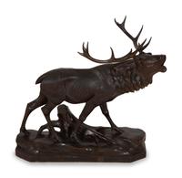 A Swiss Black Forest Carved Walnut Figure of an Elk