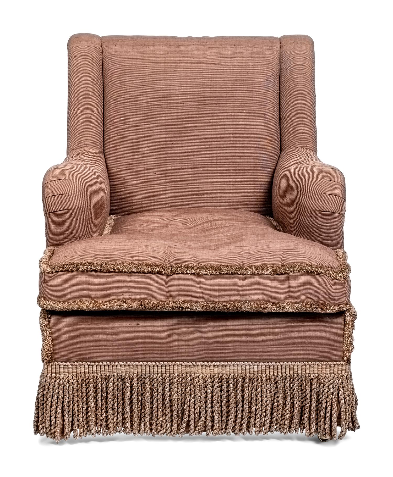 An English Upholstered Easy Chair