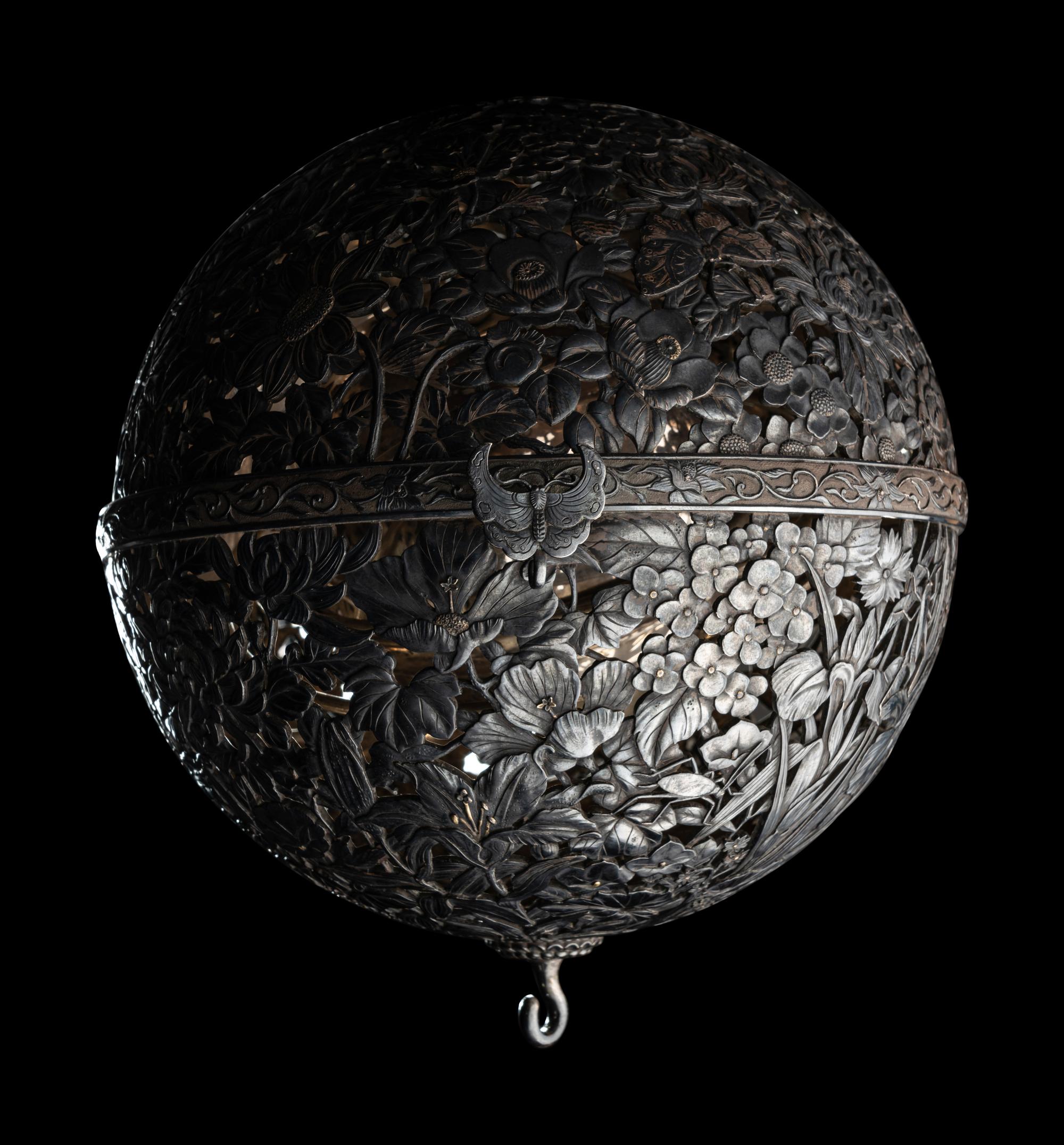 A Japanese Silver and Parcel Gilt Hanging Incense Ball