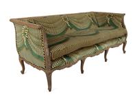 A Louis XV Style Carved and Stained Mahogany Sofa