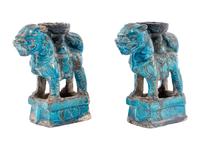 A Pair of Chinese Turquoise Glazed Pottery Fu Lion-Form Candle Holders