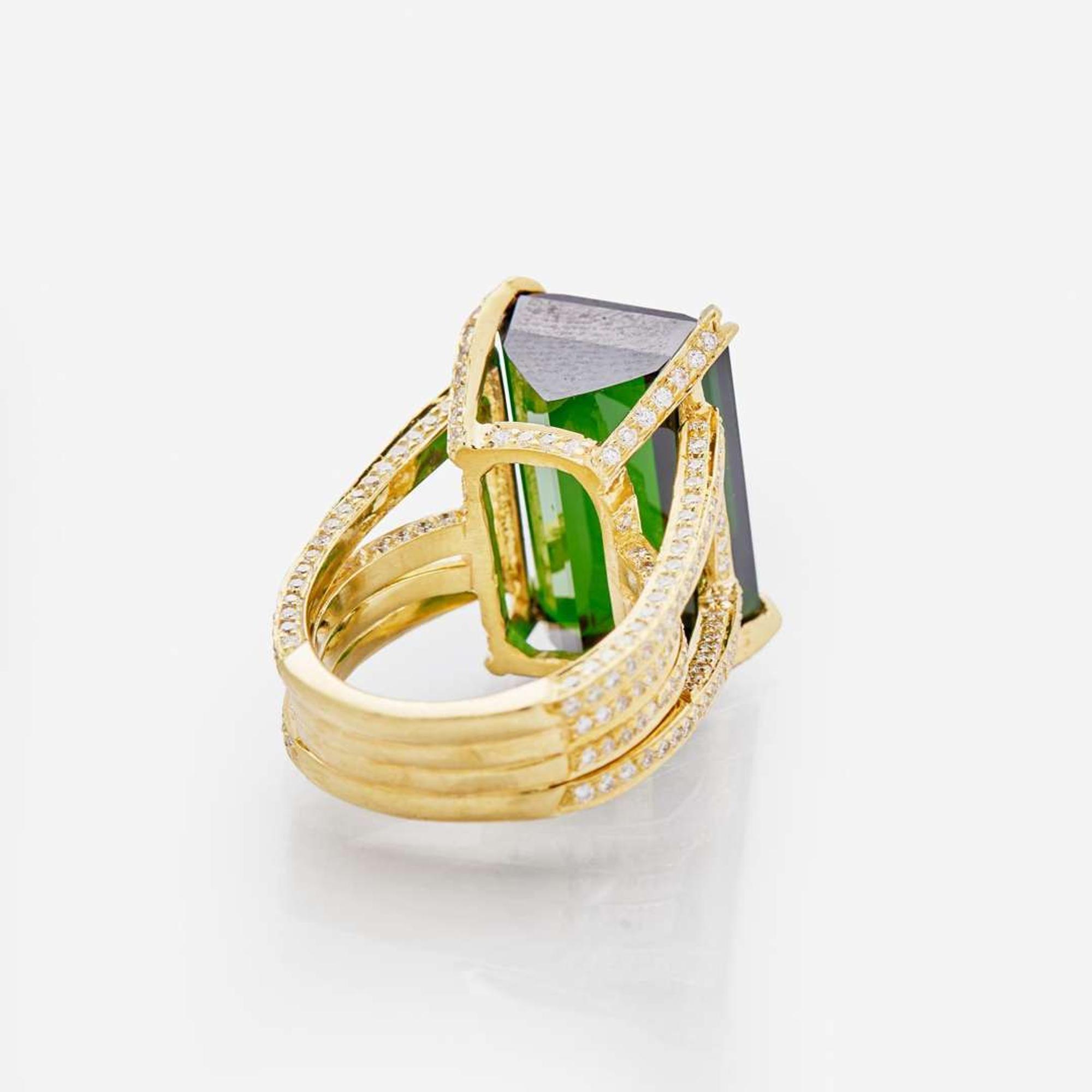 An 18K Yellow Gold, Green Tourmaline, and Diamond Ring