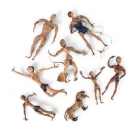 Eighteen Painted Rubber Folk Art Figurines