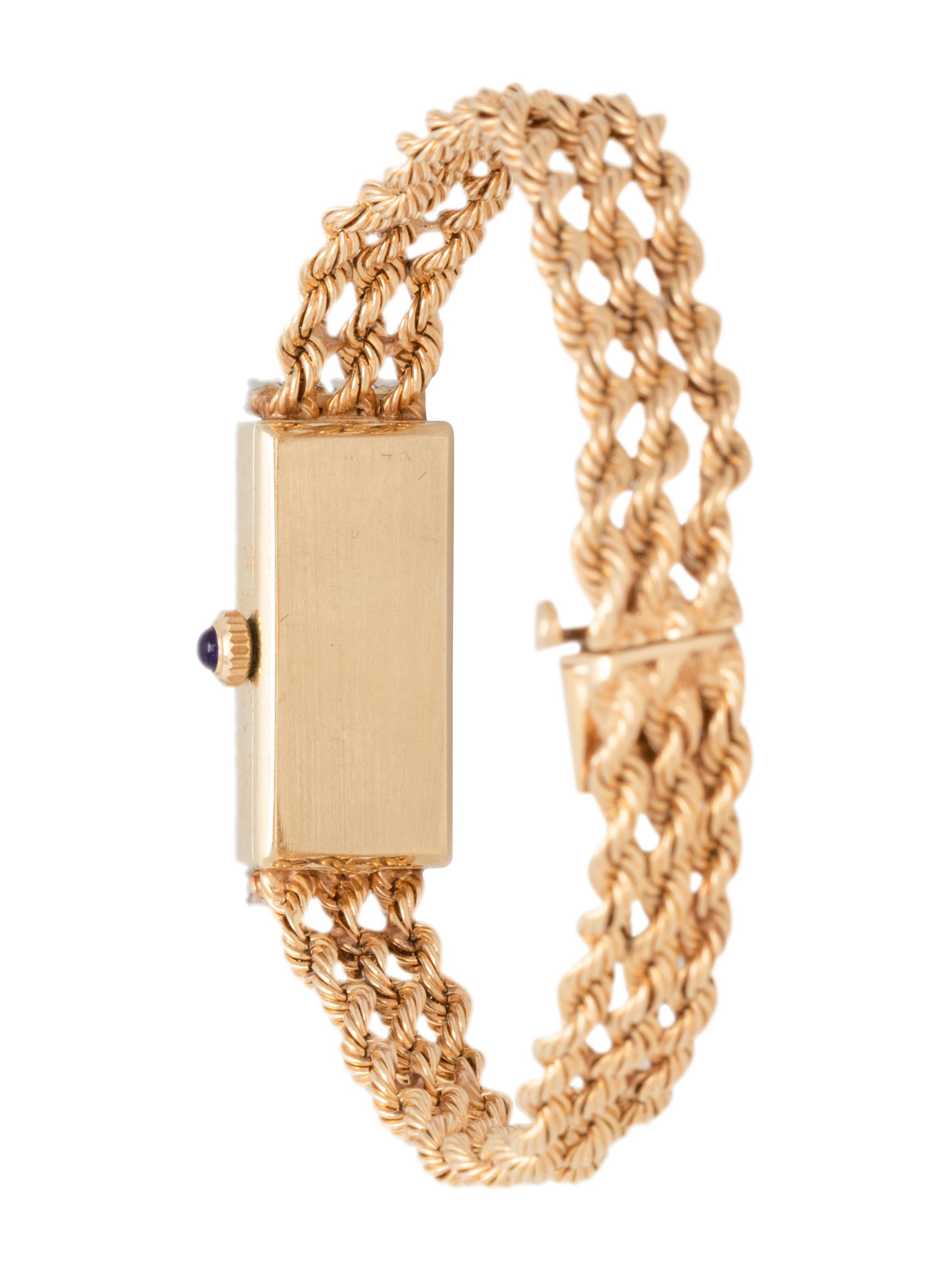 BAUME & MERCIER, 14K YELLOW GOLD AND DIAMOND WRISTWATCH