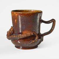 George Ohr (American, 1857-1918) Mug with Snake in Mirrored Speckled Brown with Speckled Olive Interior, Biloxi, Mississippi, USA, circa 1898-1910