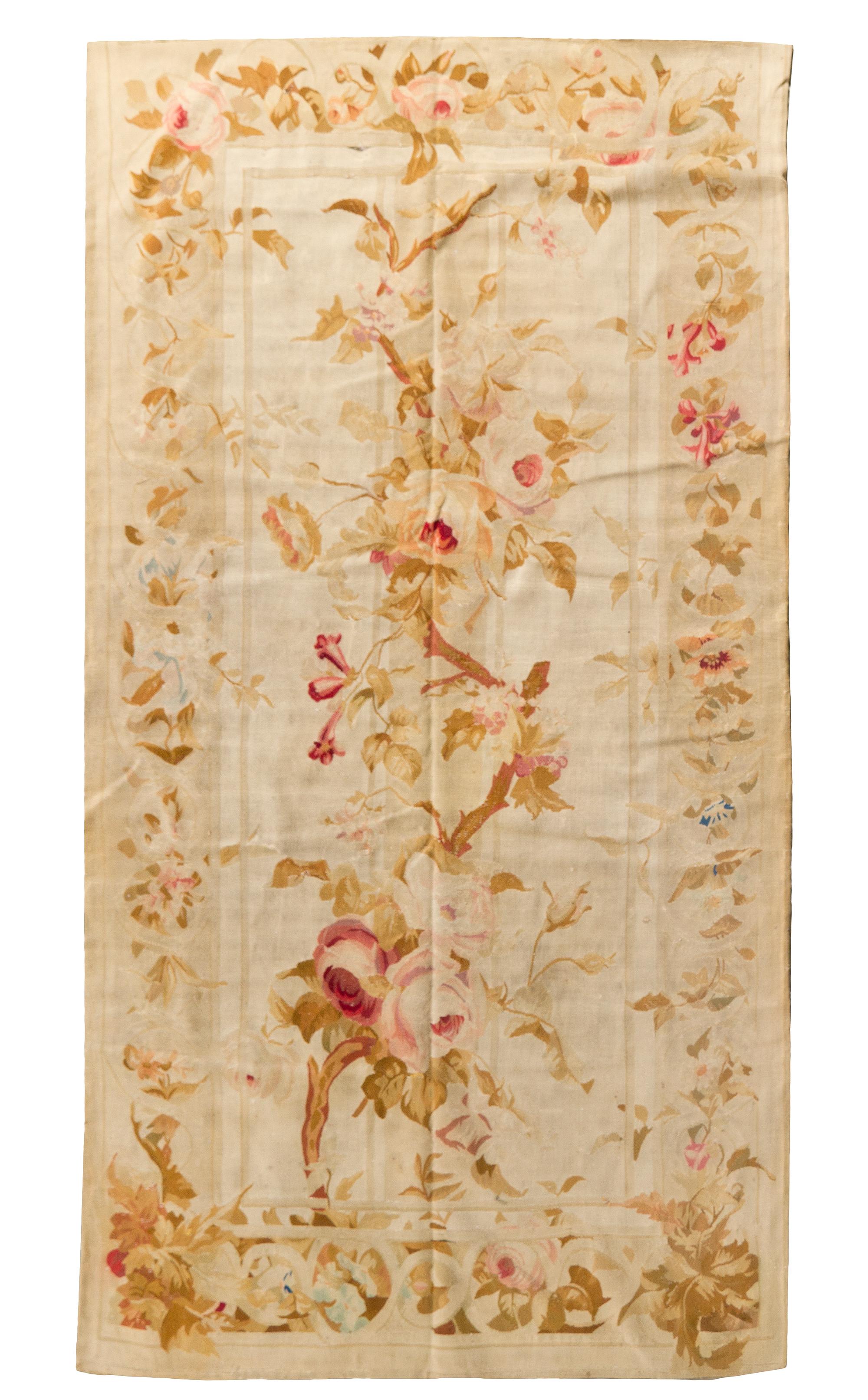 An Aubusson Wool Rug, 8 feet 7 inches x 4 feet 8 inches.