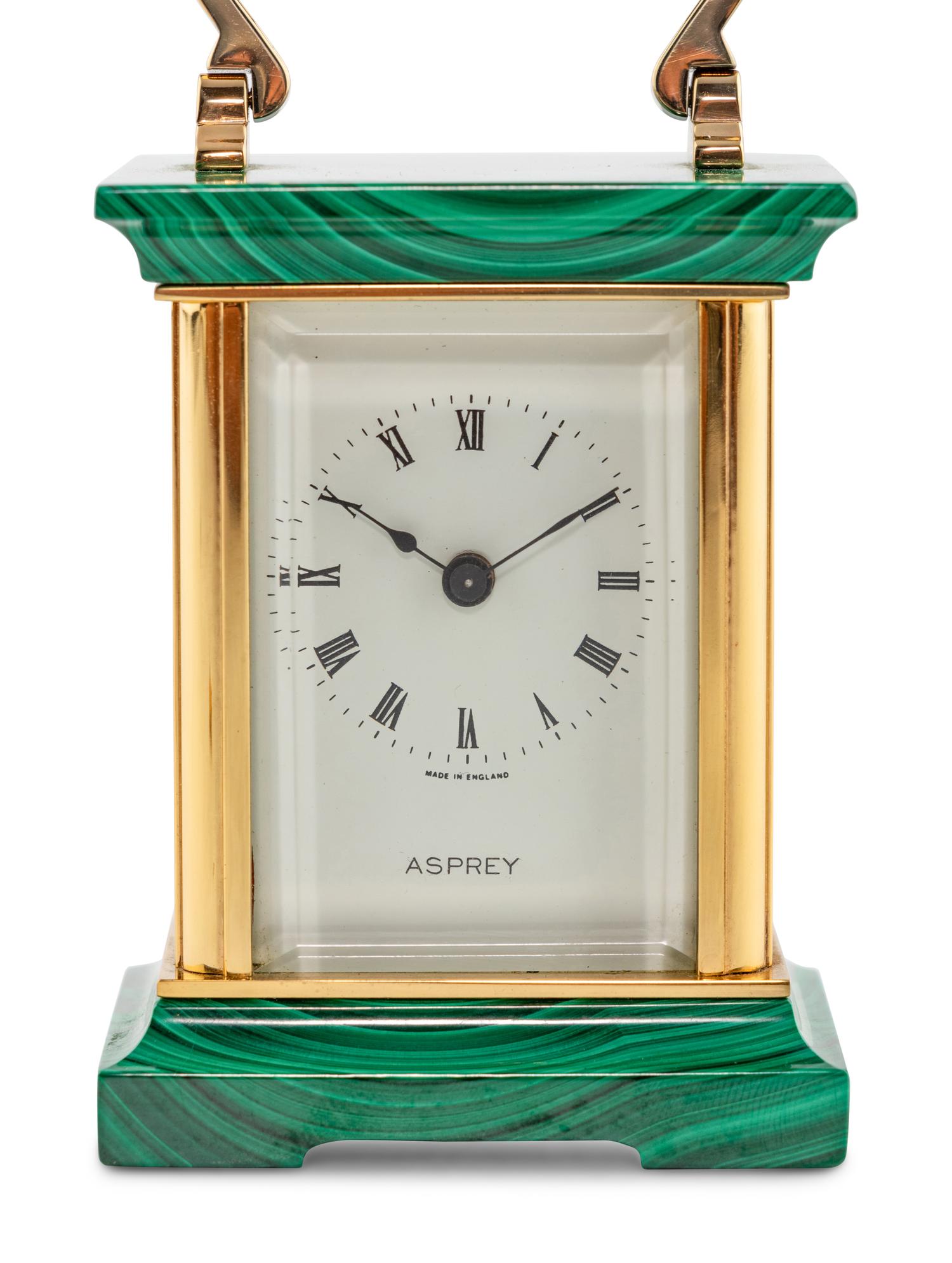 An Asprey and Co. Malachite and Brass Carriage Clock