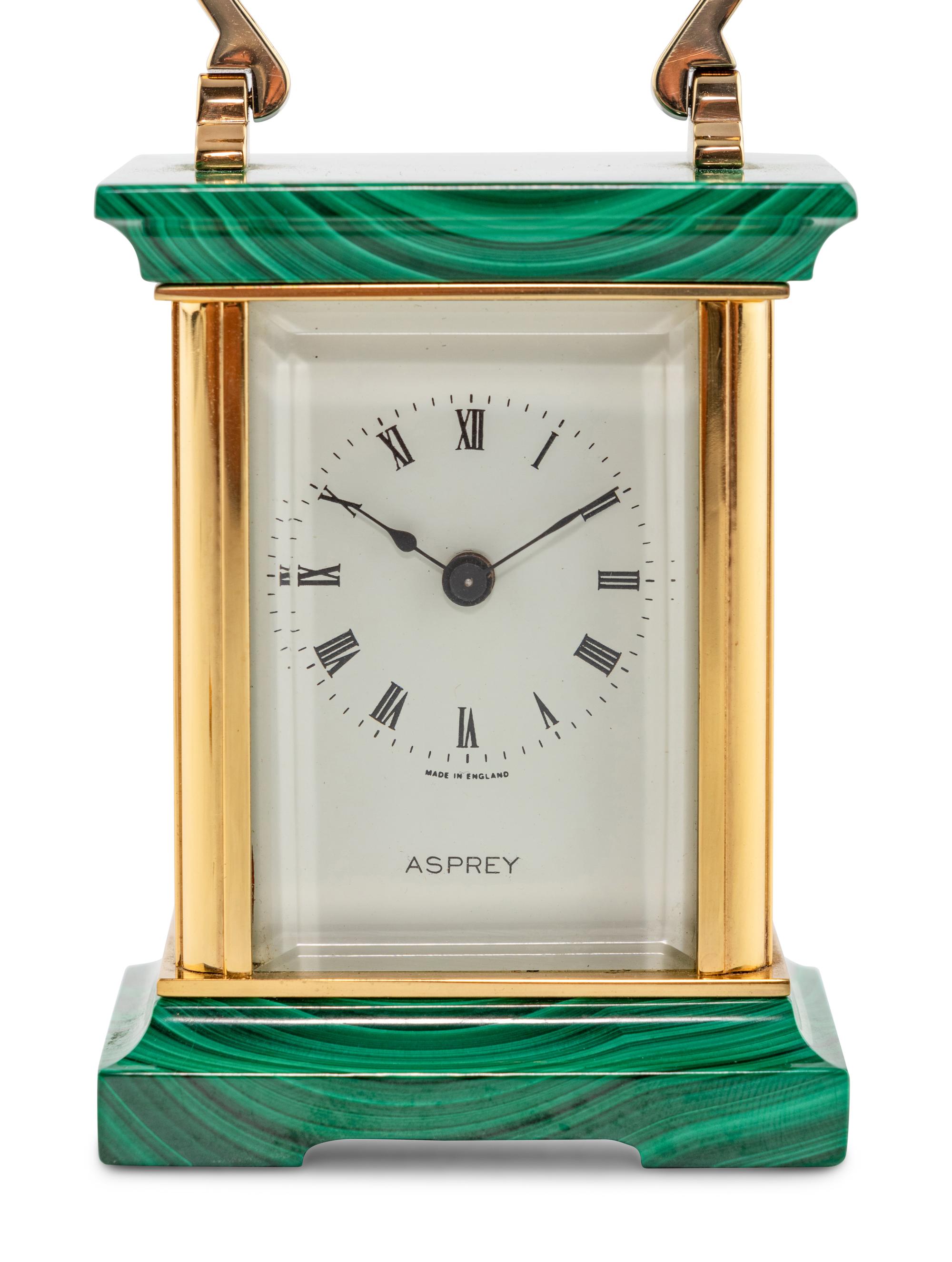 An Asprey and Co. Malachite and Brass Carriage Clock