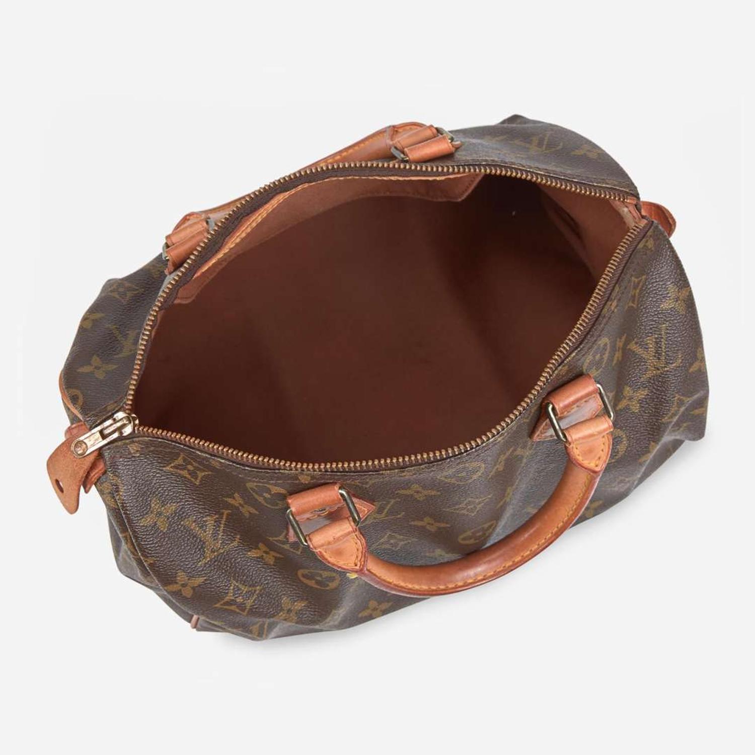 A Louis Vuitton Brown Monogram Speedy 30 Louis Vuitton