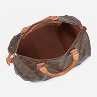 A Louis Vuitton Brown Monogram Speedy 30 Louis Vuitton