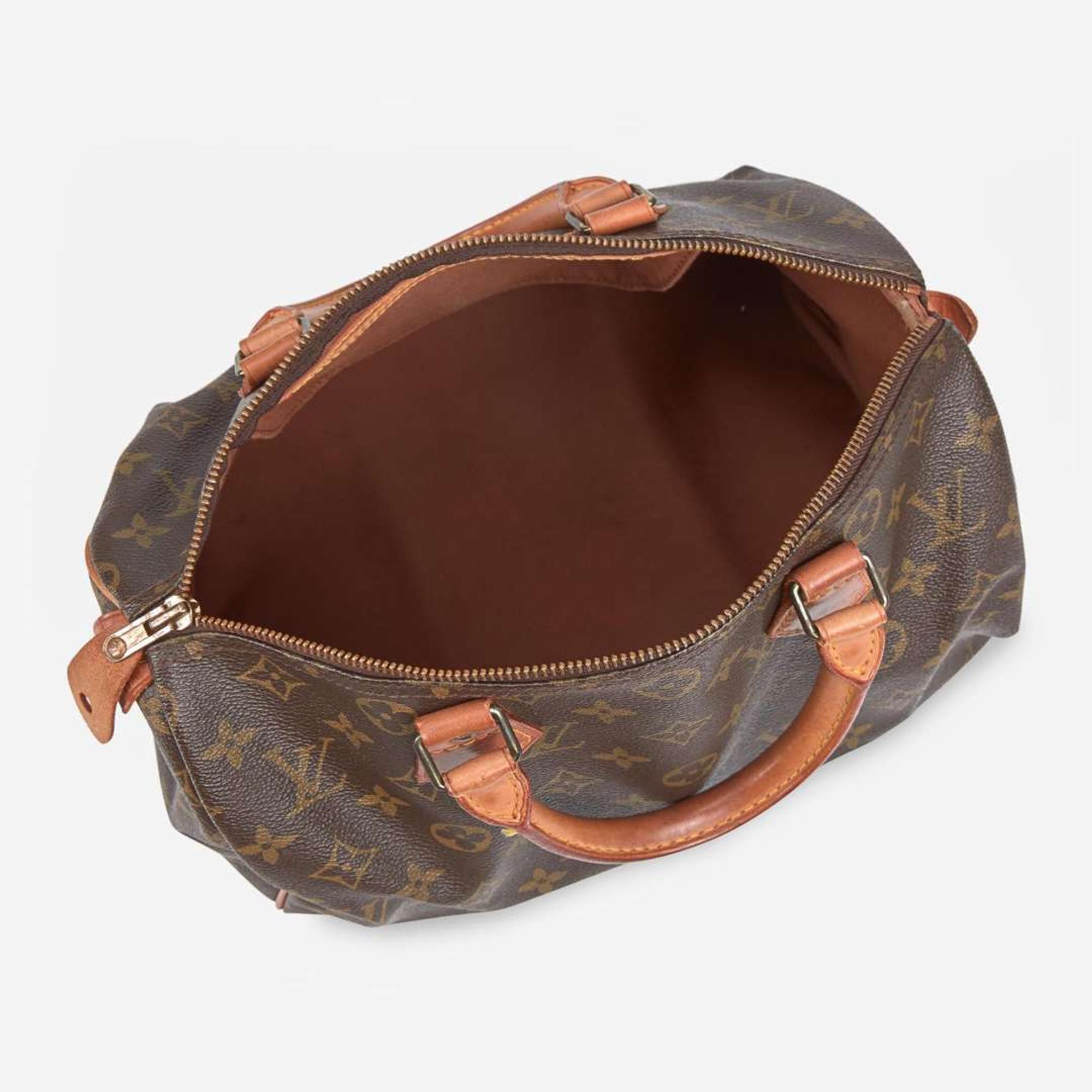 A Louis Vuitton Brown Monogram Speedy 30 Louis Vuitton