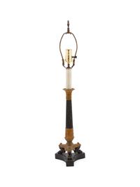 An Empire Style Ebonized and Gilt Metal Table Lamp
