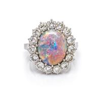 A Platinum, Diamond and Opal Ring, 5.90 dwts.