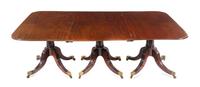 A George III Style Mahogany Triple-Pedestal Dining Table Height 28 x length 112 3/4 x depth 52 1/4 inches. — 19TH CENTURY
