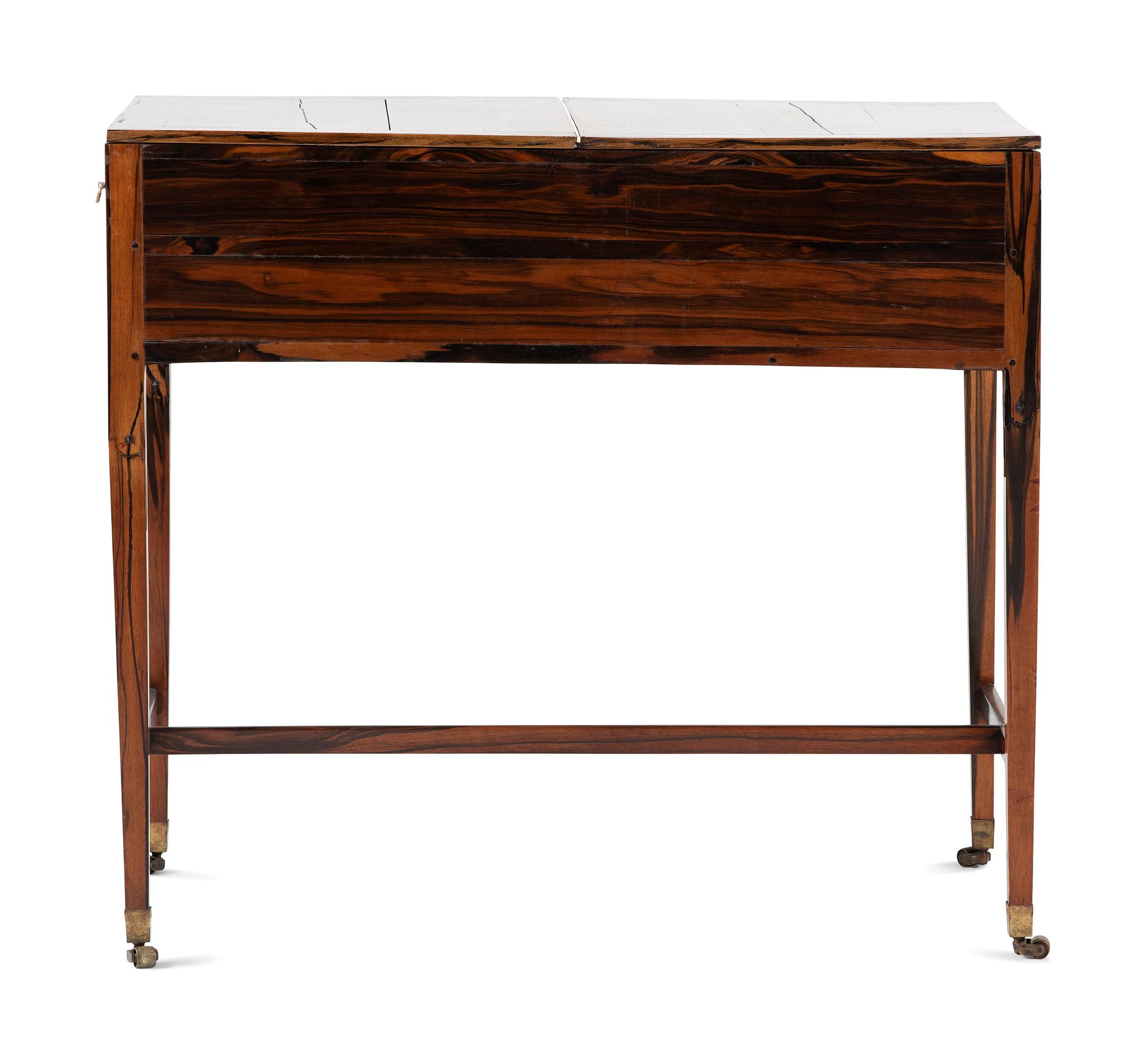 A Regency Ivory Inlaid and Silver Mounted Calamander Campaign Desk
