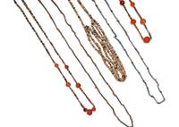 Five Egyptian Carnelian, Shell, and Ceramic Necklaces