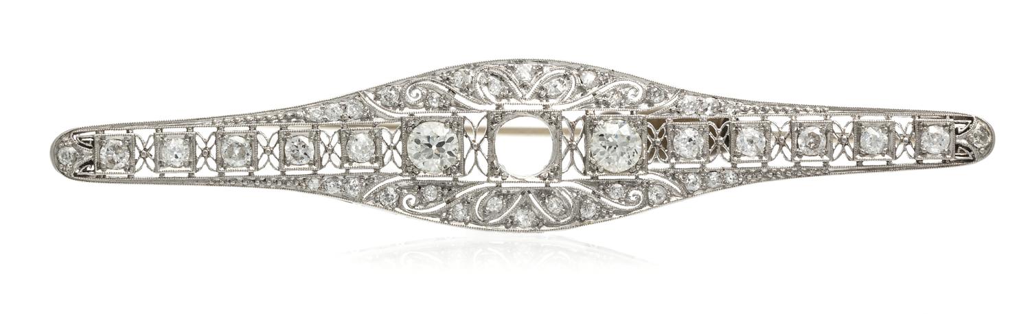A Diamond and Platinum Bar Pin, 10.30 dwts.