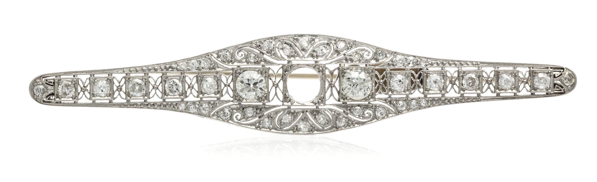 A Diamond and Platinum Bar Pin, 10.30 dwts.