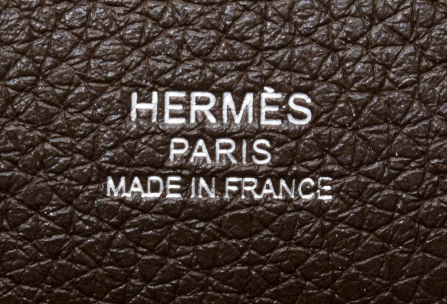 An Hermes Noisette Good News PM Handbag, 11" x 10" x 5".