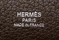 An Hermes Noisette Good News PM Handbag, 11" x 10" x 5".